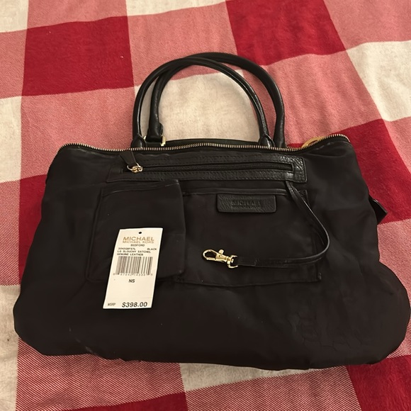 Michael Kors Black Shoulder Bag with gold zipper and buckles. - Picture 3 of 4